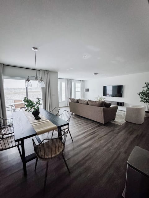 Dining room with adjacent living room