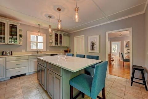 Well-appointed kitchen with an oversized island that seats four people.