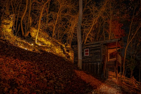 Boulders and Cliffs Lit up at Night