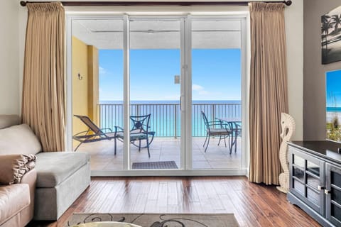 Condo, Multiple Beds (Tropic Winds 1104) | Living area | TV