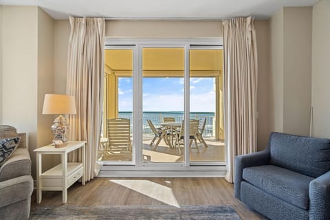 Condo, Multiple Beds (Beach Colony Tower 5B) | Living area | TV