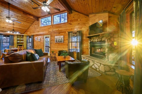 Nestle into the living room and enjoy the warm glow of the electric fireplace.


