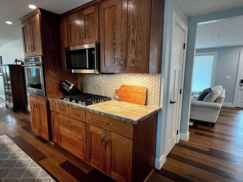 Gas cooktop, wall over and microwave for easy meal prep.