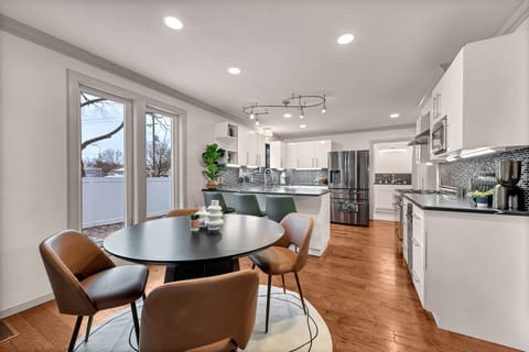 We can easily seat 16 between the dining room and eat in kitchen.