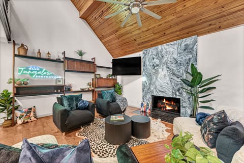 Welcome to the Jungalow! Sit by the cozy gas fireplace right as you step inside.