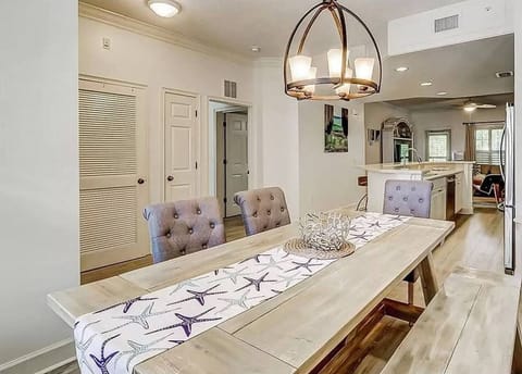 Dining area looking toward Living room with 2nd bedroom and bath on left through doorway.