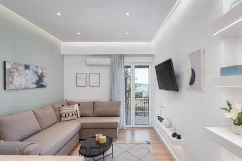 Comfort Apartment | Living area | 43-inch Smart TV with cable channels, Netflix, streaming services