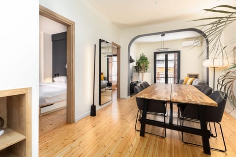 City Apartment | Living area | 40-inch Smart TV with cable channels