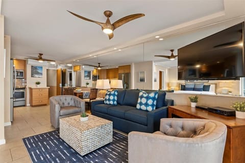 Enjoy a movie with the family on the comfy couch and lounge chairs