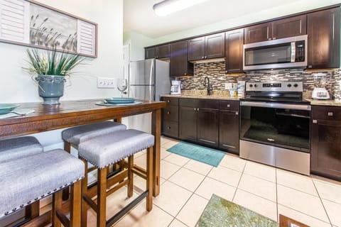 Condo, 1 Queen Bed with Sofa bed (Merrimac Resort #32) | Private kitchen | Oven, toaster