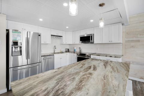 Condo, Multiple Beds (Edgewater Tower 1-412) | Private kitchen | Oven, toaster