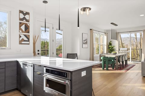 Fully stocked kitchen including dishwasher and drawer microwave.