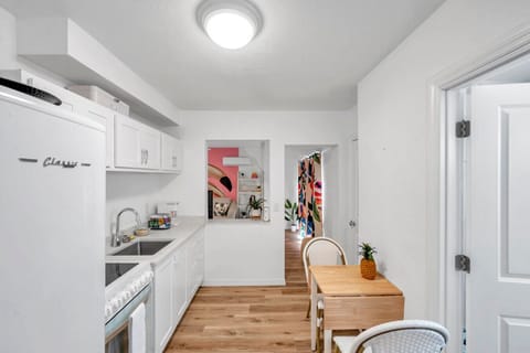 Bright galley kitchen w/ clean lines & everything set up for easy, everyday cooking.