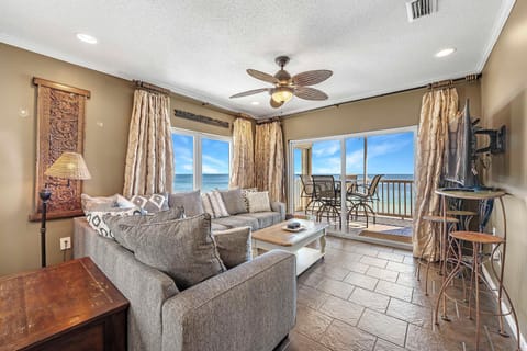 Condo, Multiple Beds (Riviera Dunes 501) | Living area | TV