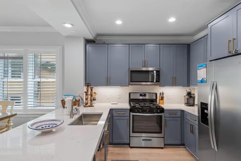 Condo, Multiple Beds (Adagio F205) | Private kitchen | Oven, toaster