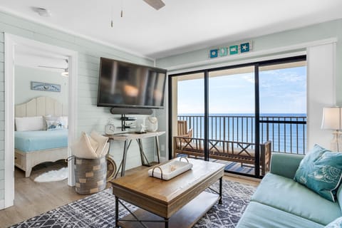 Condo, 1 King Bed with Sofa bed (Commodore 1302 Caspian Rose) | Living area | TV