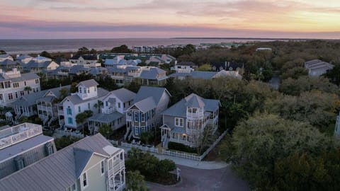 Aerial view of the property with the sea in the background