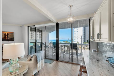 Condo, Multiple Beds (Surfside Resort #208- Emerald Dreams) | Living area | TV