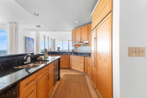 Condo, Multiple Beds (Mediterranean East 401) | Private kitchen | Oven, toaster, paper towels