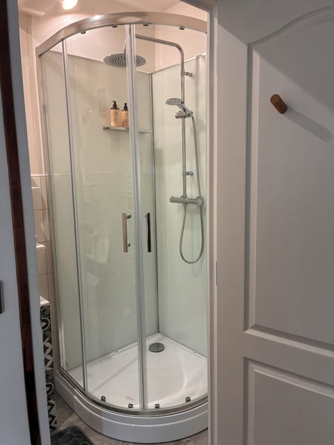 Family Room, 1 King Bed with Sofa bed, Garden View, Garden Area (Sword Beach) | Bathroom | Shower, hydromassage showerhead, designer toiletries, hair dryer