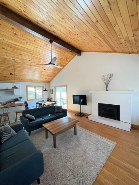 Family Room with Gas fireplace and 55` Smart TV