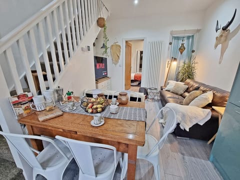 Family Apartment | Living area | 50-inch Smart TV with satellite channels