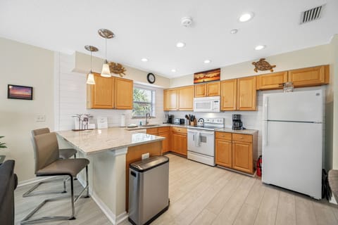 Beautifully updated kitchen with breakfast bar