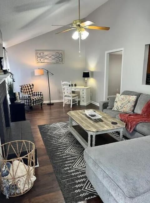 Living room with desk and reading chair