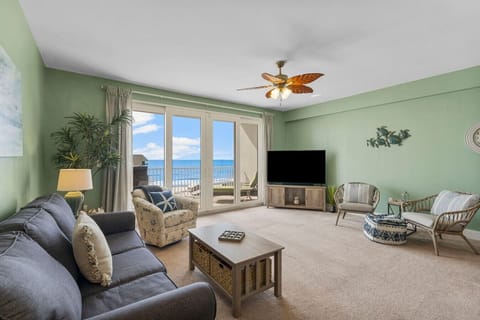 Living Area with Ocean Views, Flat Screen TV, Sleeper Sofa and Private Balcony Access