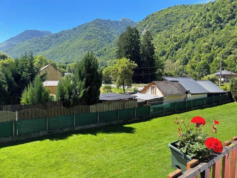 View of gardens and mountains from front balcony of sitting room and bedroom 1