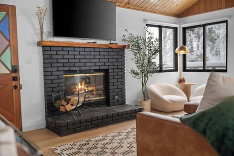 Wood burning fireplace with gas starter.