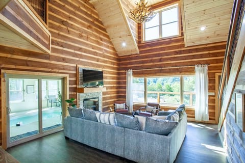 Open concept living area with smart tv and electric fireplace