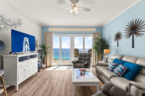Relax in this coastal living room with ocean views and modern decor.