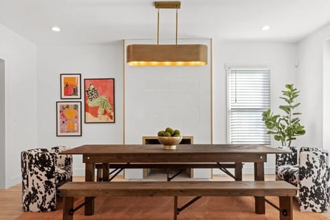 Stylish dining space with statement lighting.