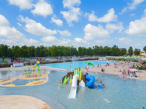 Sky, Cloud, Water, Outdoor Recreation, Leisure, Recreation, Fun, City, Swimming Pool, Tree