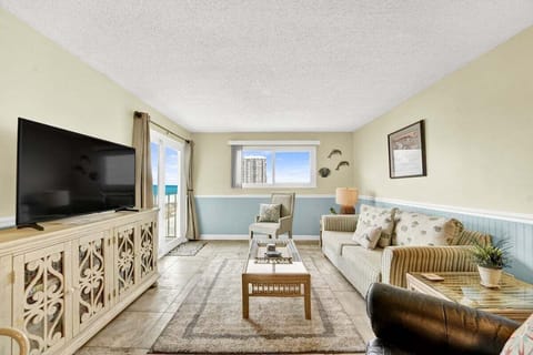 Living room with sleeper sofa & private balcony. Gulf views!