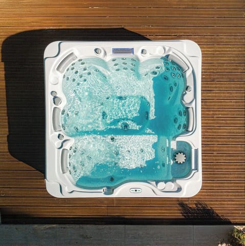 Relax and take in the waterfront view from the 7-person hot tub, complete with 50 massaging jets—it's open and available year-round and maintained by a PHTA-certified operator for your safety.