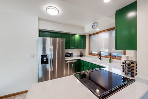 You’ll find plenty of countertop prep space in the fully-loaded kitchen, with all the cookware, bakeware, dishware, flatware, glassware, and utensils you need to prepare your favorite meals.