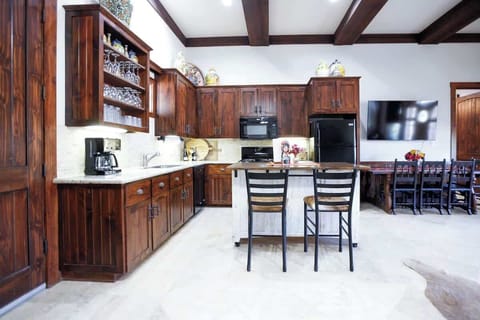 Enjoy our large kitchen with plenty of counter space and island for cooking dinner for the family!