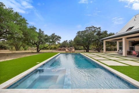Welcome to the Round Top Ranchette! Enjoy the oversized pool with hot tub on an 8 acre estate. 