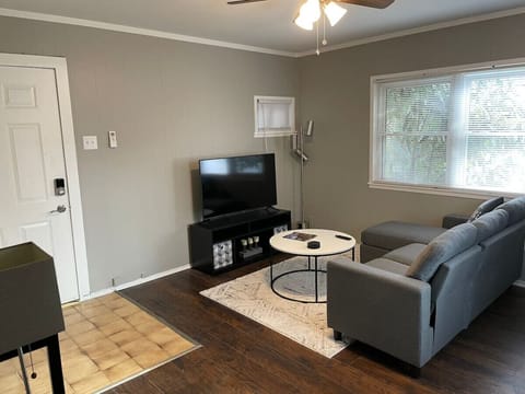 Relax and unwind in the living area with smart TV and seating.