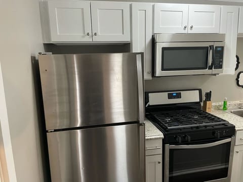 Modern kitchen with stainless steel appliances and plenty of storage