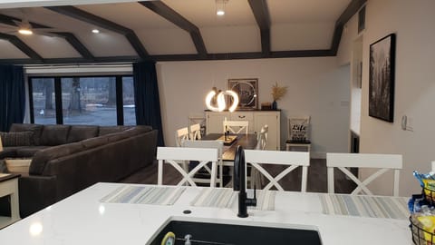 Elevate your dining experience with high ceilings and dim lighting for ambiance.