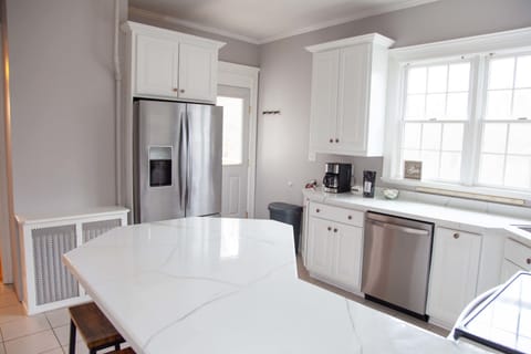 Kitchen– Bright, spacious, and stocked with essentials