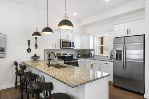 Full Kitchen with Extra Bar Seating