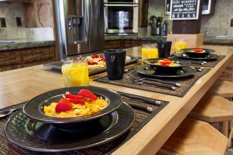 This dining setup promises delicious meals, great conversation, and unforgettable moments at Chandler's Lodge.