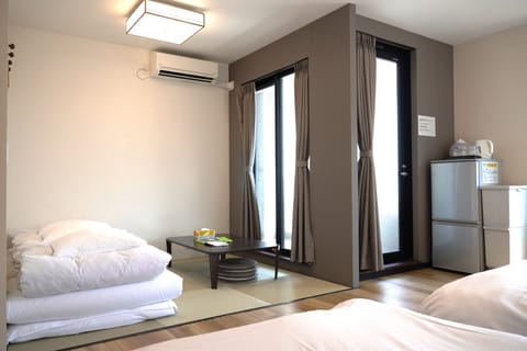 Blackout drapes, iron/ironing board, free WiFi, bed sheets