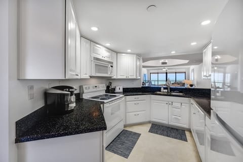 Fully stocked kitchen with views of the Gulf of Mexico and intercoastal