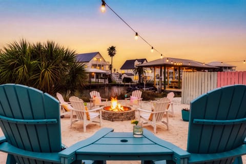 Morning coffee or evening cocktails by the fire — this is your beach escape