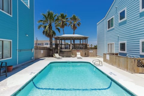 Relax by the pool after a day at the beach – Just steps from your door!